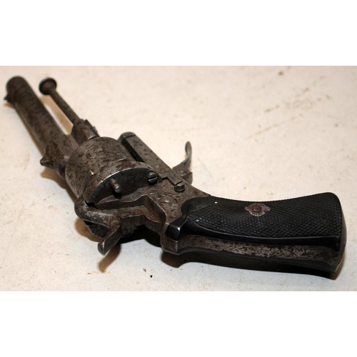 168 - Antique Six chamber revolver with functioning pull down trigger. Chamber rotates intermittently. Cer... 