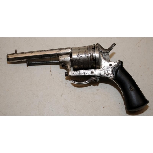 169 - Antique Six chamber revolver with pull down trigger. Mechanism requires attention. Certification exe... 