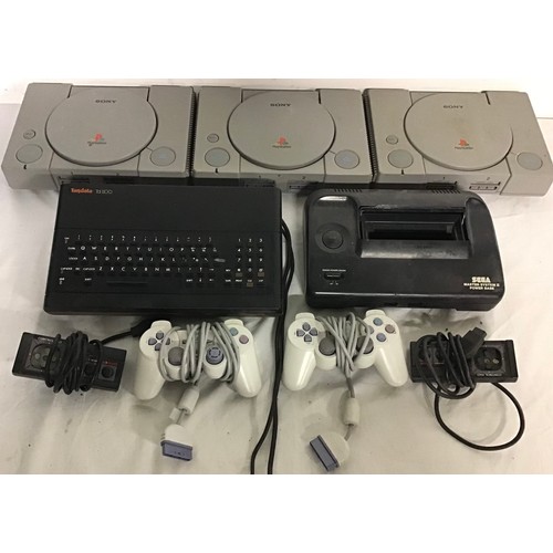 441 - VARIOUS GAMING DEVICE CONSOLES. Here we find 3 x Sony PlayStations - Sega Master System power base a... 