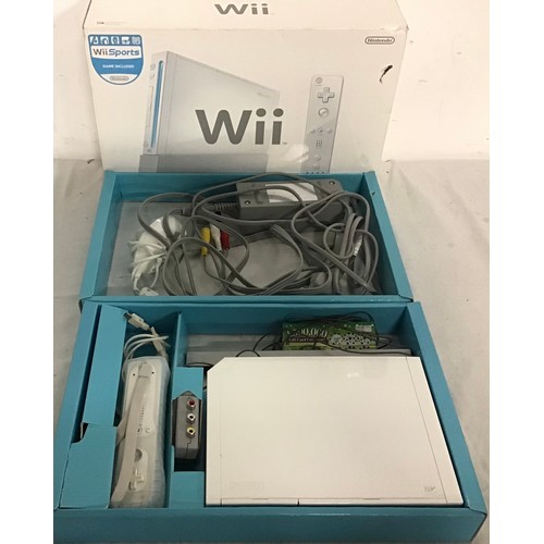 440 - Wii BOXED GAMING CONSOLES. Here we have a set of 3 boxed gaming consoles to include power supplies h... 