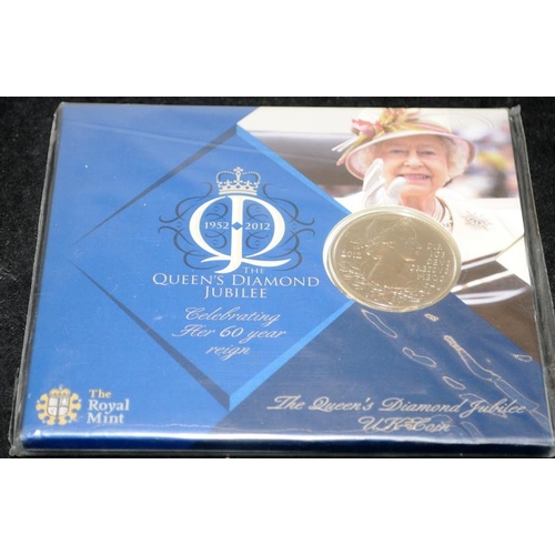 457 - A collection of Royal Mint BU and carded Coins to include 2 x 2017 £1 coin, 2012 £5 Crown, 2012 colo... 