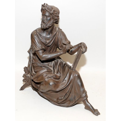 517 - Large bronzed figure of a classical scholar. 31cms tall