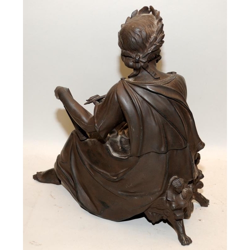 517 - Large bronzed figure of a classical scholar. 31cms tall