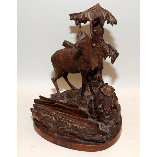 522 - Collection of vintage carved wood items to include a Black Forest pen stand and ink well featuring a... 