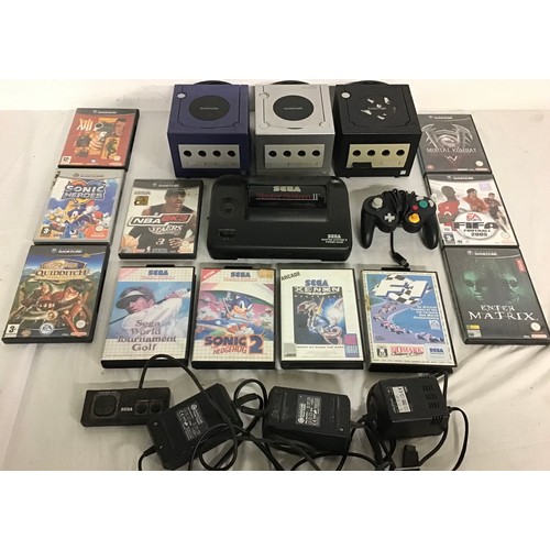 438 - COLLECTION OF GAMECUBE AND SEGA GAMING ITEMS. Here we have 3 GameCube consoles - Sega Master System ... 