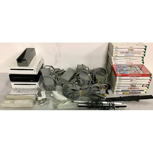 437 - Wii CONSOLES AND ACCESSORIES. Here we find 3 Wii consoles along with leads, power supplies, controll... 