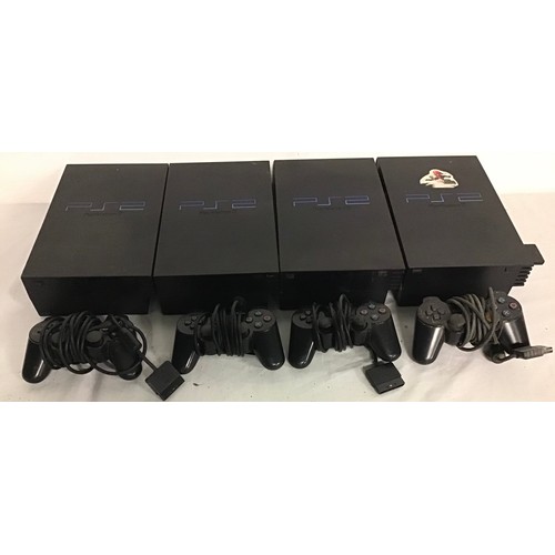 435 - SELECTION OF 4 PLAYSTATION 2 GAMING CONSOLES. Sony Playstation 2 consoles found here complete with f... 