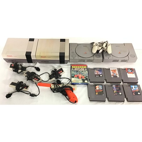 434 - SELECTION OF VARIOUS NINTENDO AND SONY GAMING GEAR. In this lot we find two Sony PlayStations along ... 