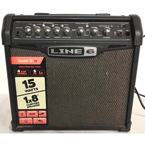 495 - GUITAR AMPLIFIER BY LINE 6. This unit is model number Spider IV 15 and powers up when plugged in.