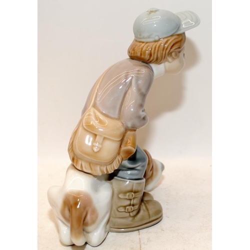 444 - Lladro figure 1970s Hunting Boy with Blood hound 19cm tall