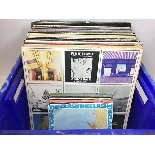 188 - BOX OF VARIOUS ROCK AND POP ALBUMS AND SINGLES. Found here we have a varied collection of artist’s t... 