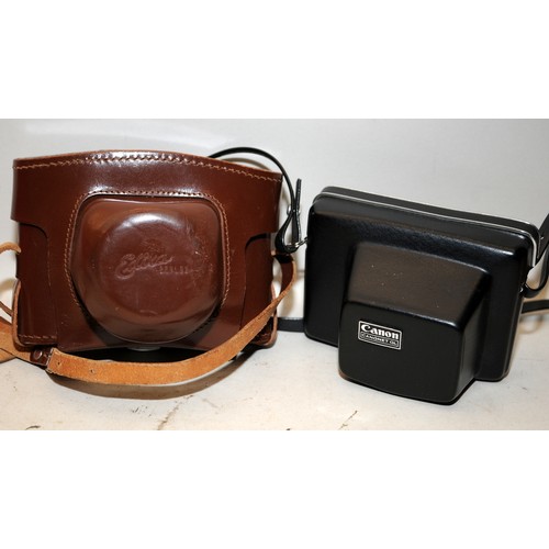 440A - Vintage Wergin Edixa Reflex 35mm camera c/w a Canon Canonet QL17 35mm compact camera. Both with orig... 