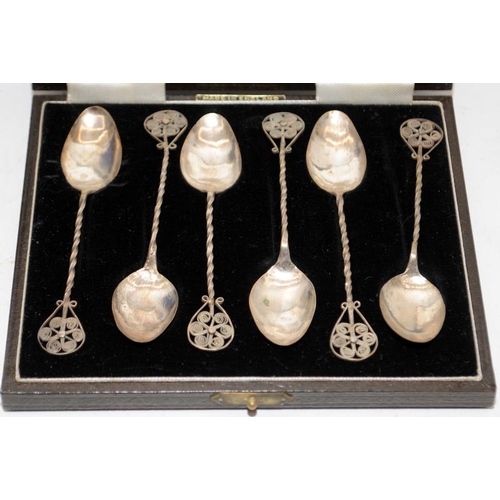 217 - A collection of silver plated items to include an antique hip flask and cased flatware. Includes con... 