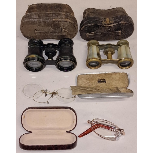 59 - Two pairs of cased opera glasses together with two pairs of spectacles (4).