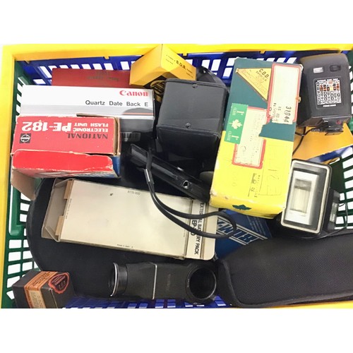 66 - A large crate of vintage photographic accessories and attachments. Some leading brands. Good lot to ... 