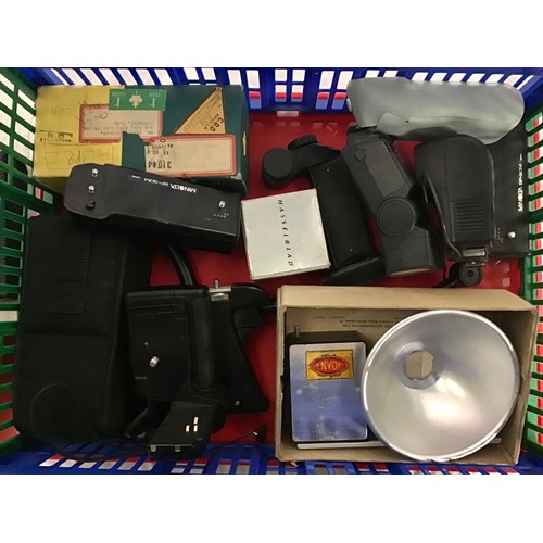 66 - A large crate of vintage photographic accessories and attachments. Some leading brands. Good lot to ... 