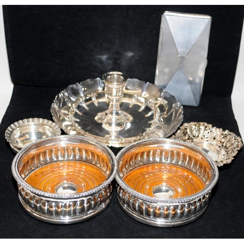 150 - A collection of silver plated items including wine coasters, bon bon dishes and a candle nightstick