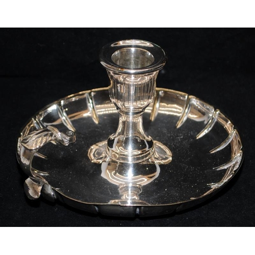 150 - A collection of silver plated items including wine coasters, bon bon dishes and a candle nightstick