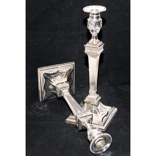 245 - Pair of imposing silver plated candlesticks in Georgian neo-classical style, 33cms tall