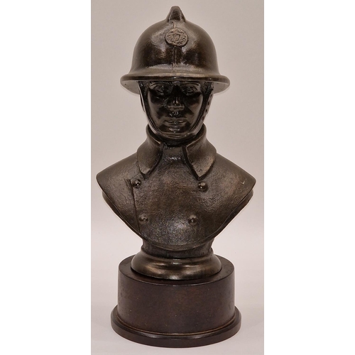 107 - Bronzed resin bust of a fireman 25cm tall.