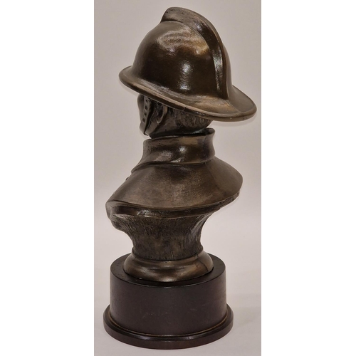 107 - Bronzed resin bust of a fireman 25cm tall.