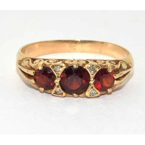 156 - 9ct gold ladies vintage Garnet dress ring size O