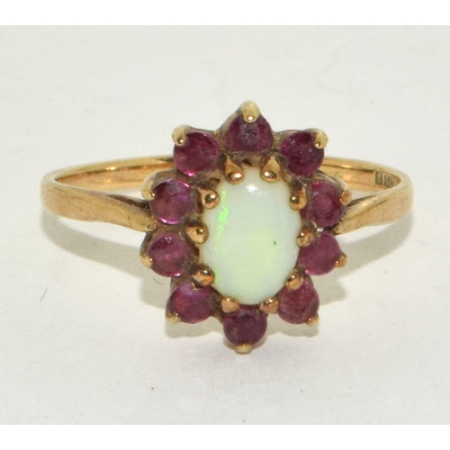 140 - 9ct gold ladies Opal and Ruby cluster ring size O