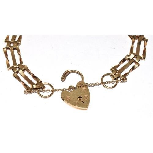 192 - 9ct gold 3 bar gate bracelet with lock and safety chain 19cm long , 9.5g