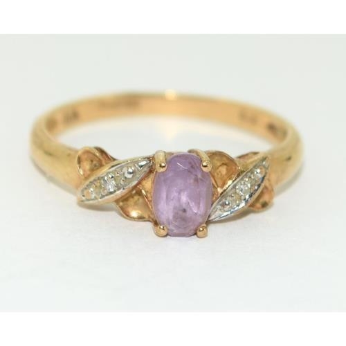 218 - 9ct gold ladies Diamond and Amethyst dress ring mark Diamond in ring size N