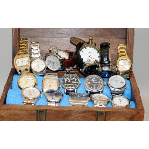 225 - Wooden casket containing a quantity of gents fashion watches