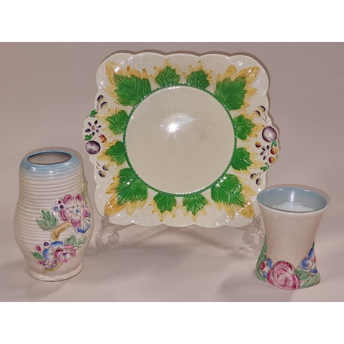 119 - Pair of Clarice Cliff sandwich plates together with two vases (4).