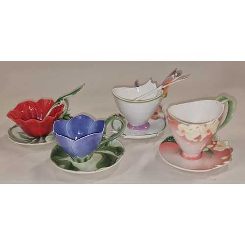 120 - Franz Porcelain collection of decorative cups and saucers (4).