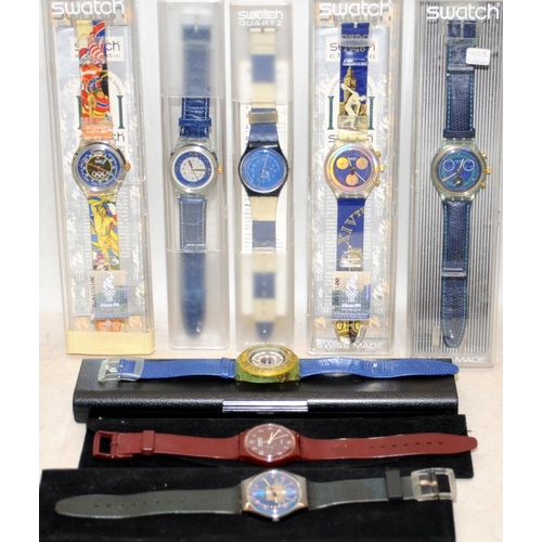 163 - A collection of vintage Swatch Watches, many still boxed. 8 in lot