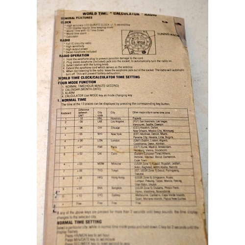 193 - Rare 1980's Zeon FM radio - calculator - world time -digital LCD watch with original packaging. In e... 