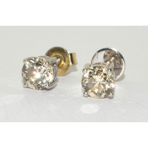 159 - Diamond earrings approx 0.33 points in each on 18ct gold mounts.