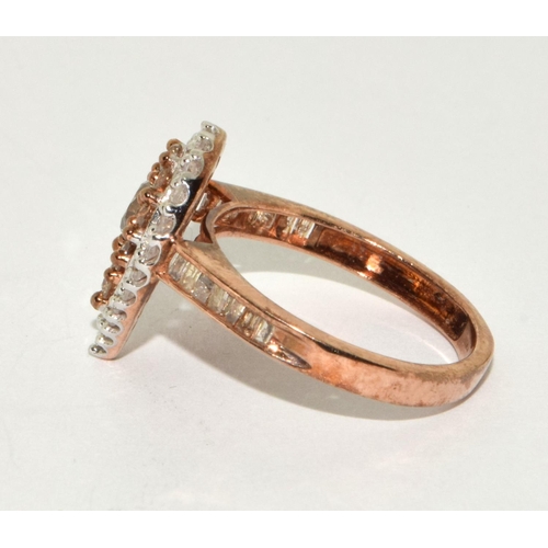 179 - A 9ct gold ring set with Champagne diamond/white diamond centre stone approx 0.25 point ,Size O