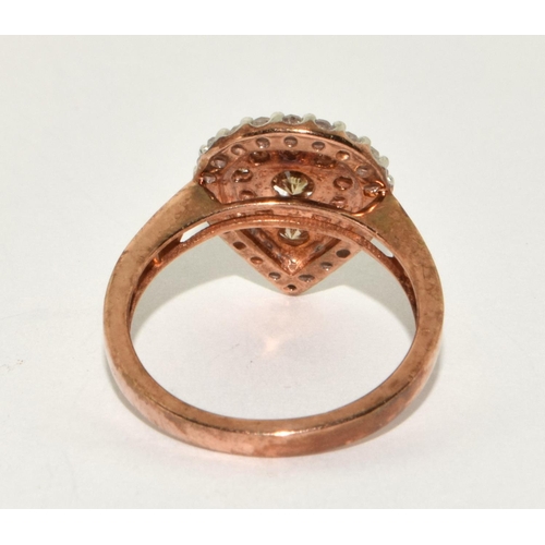 179 - A 9ct gold ring set with Champagne diamond/white diamond centre stone approx 0.25 point ,Size O