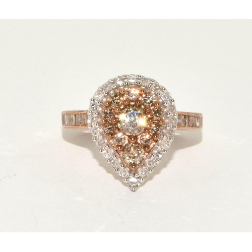 179 - A 9ct gold ring set with Champagne diamond/white diamond centre stone approx 0.25 point ,Size O