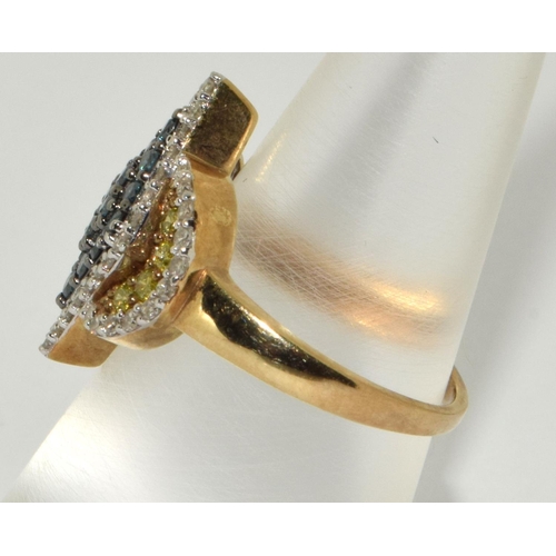 180 - A 9ct gold ring set with blue/yellow/white and champagne diamonds Size N