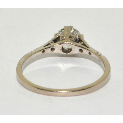 240 - A 18ct gold (tested) and diamond ring, approx 0.75ct with shoulders, Size p