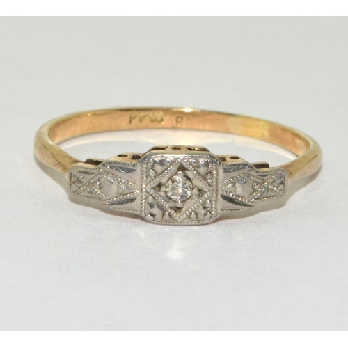 200 - An Edwardian 9ct gold and platinum diamond ring Size o.