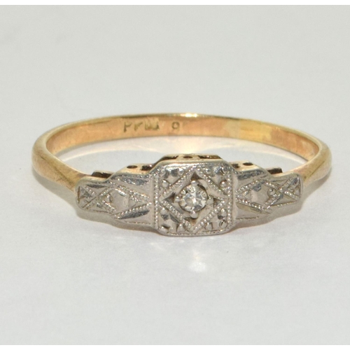 200 - An Edwardian 9ct gold and platinum diamond ring Size o.