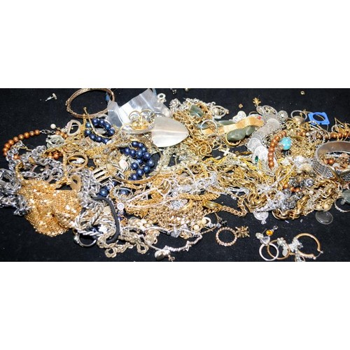 228 - A Bag of costume jewellery.