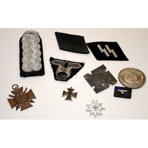 322 - Collection of WWI and WWI German Military badges and insignia