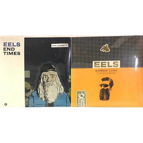 164 - VINYL LP RECORDS X 2 FROM THE EELS. Titles here are - End Times - Hombre Lobo. Both vinyls are found... 