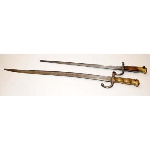 320 - Two antique French bayonets, the longest being 70cms o/all