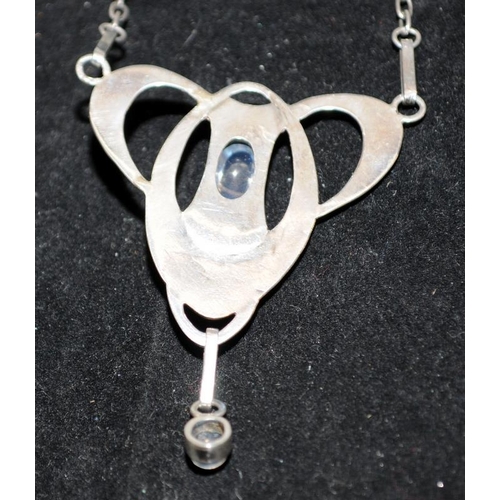 249 - White metal (unmarked) Art Nouveau pendant and chain with cabochon moonstones. Poss. Murrle Bennett.