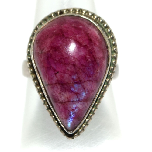 144 - A large 925 silver and pear shaped stone ring Size J.