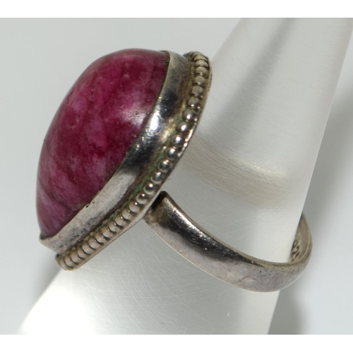 144 - A large 925 silver and pear shaped stone ring Size J.