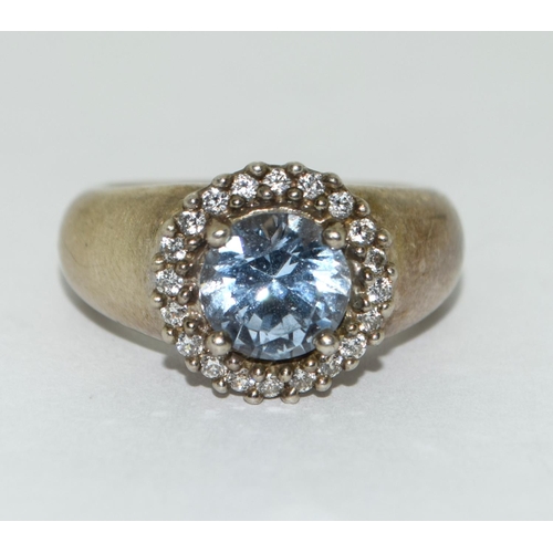 161 - A 925 silver and icy blue topaz ring Size N